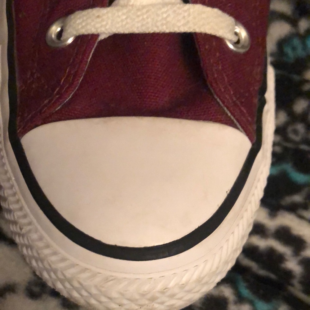 Converse maroon in color white bottoms